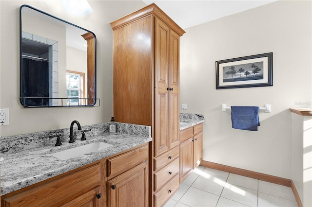 bathroom featuring vanity and tile patterned flooring