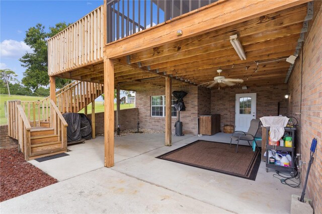 view of patio / terrace featuring a wooden deck and ceiling fan