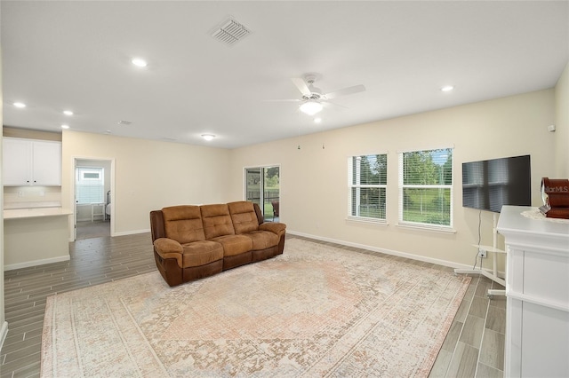 living room with ceiling fan