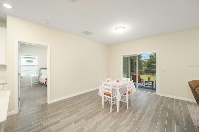 dining space featuring light hardwood / wood-style flooring