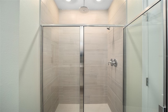 bathroom with an enclosed shower