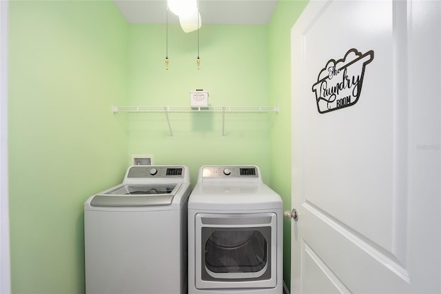 laundry room featuring washer and clothes dryer