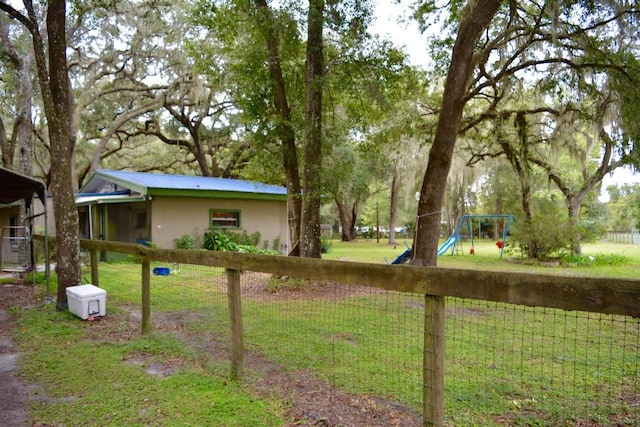 view of yard featuring a playground