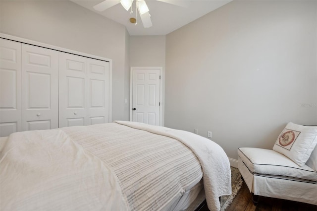 bedroom with ceiling fan and a closet