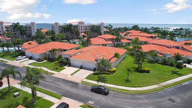 bird's eye view with a water view