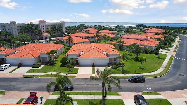 8636 Villanova Dr Unit 1201, Cape Canaveral, FL 32920 - drone / aerial view featuring a residential view and a water view