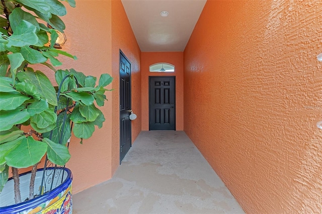 8636 Villanova Dr Unit 1201, Cape Canaveral, FL 32920 - view of exterior entry featuring stucco siding
