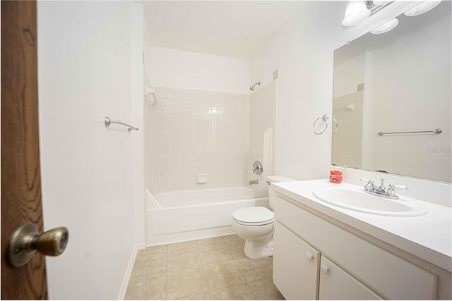 full bathroom featuring vanity, tiled shower / bath, tile patterned flooring, and toilet