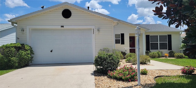 ranch-style home with a garage