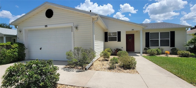 ranch-style home with a garage