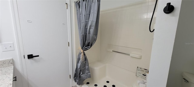 bathroom with curtained shower