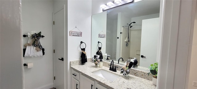 bathroom featuring vanity and walk in shower