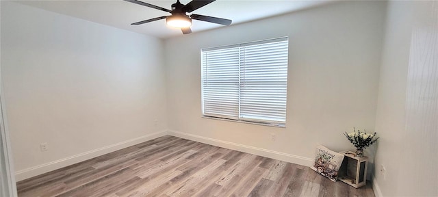 unfurnished room featuring ceiling fan and light hardwood / wood-style flooring