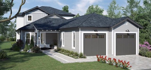 exterior space with a garage and a front lawn