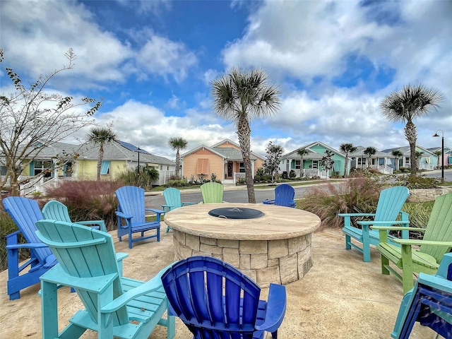 view of patio with a fire pit