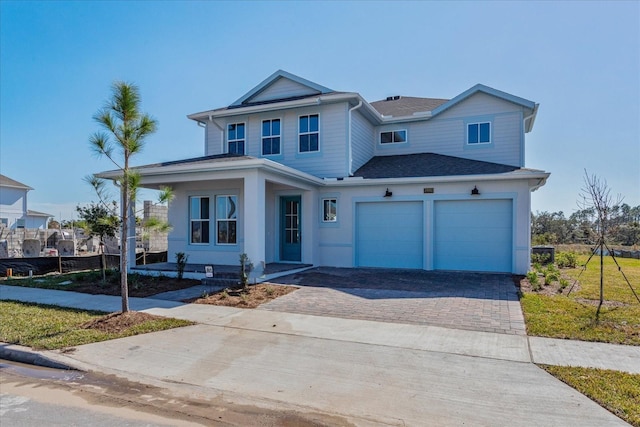 view of front of home with a garage