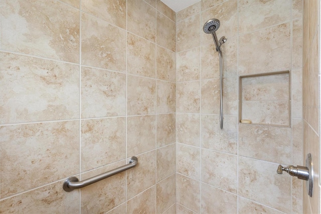 details featuring a tile shower