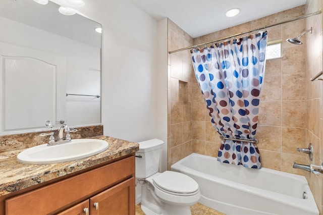 full bathroom with tile patterned floors, vanity, shower / tub combo, and toilet