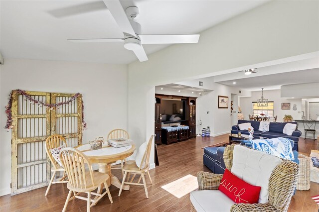 living room featuring hardwood / wood-style floors and ceiling fan