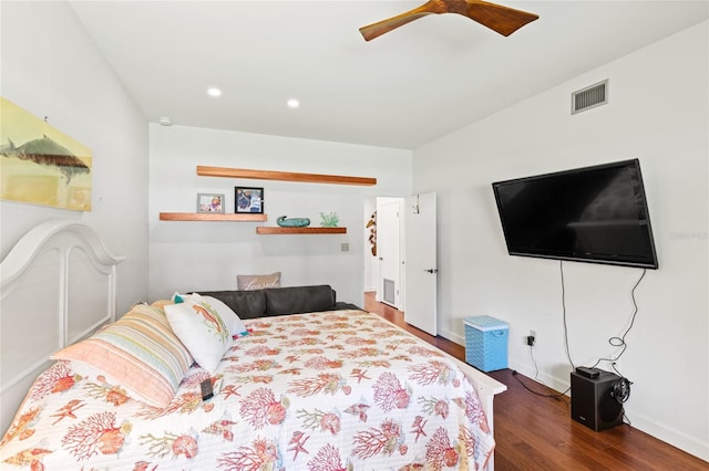 bedroom featuring dark hardwood / wood-style flooring and ceiling fan