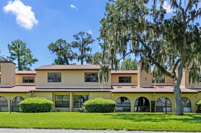 exterior space featuring a front yard