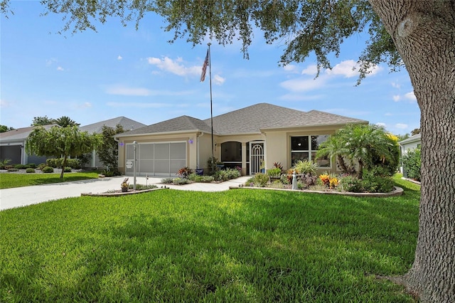 ranch-style home featuring a garage and a front yard