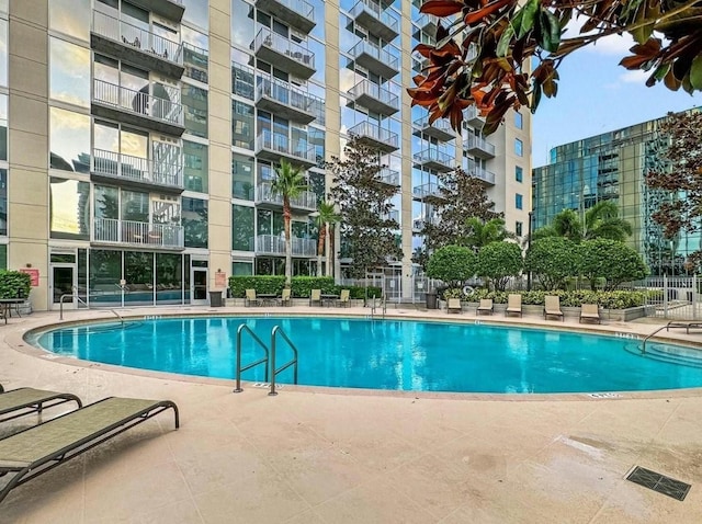 view of pool featuring a patio