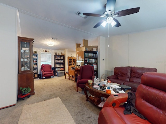 carpeted living room featuring ceiling fan