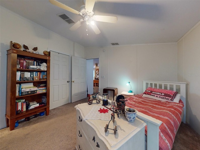 carpeted bedroom with ceiling fan