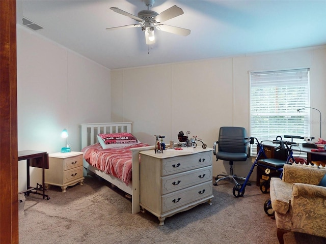 carpeted bedroom featuring ceiling fan