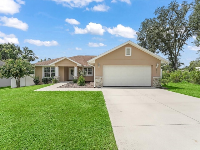 single story home featuring a garage and a front lawn