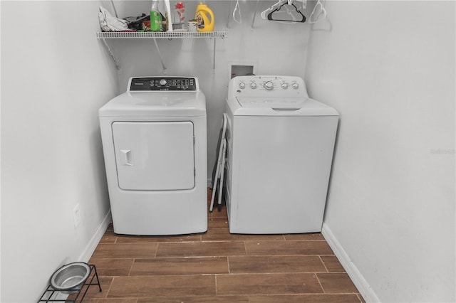 washroom with independent washer and dryer