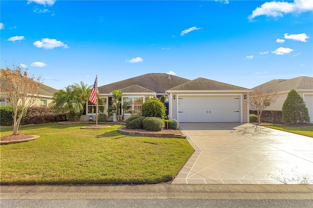 ranch-style home with a garage and a front yard