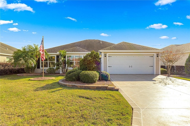 single story home featuring a garage and a front lawn