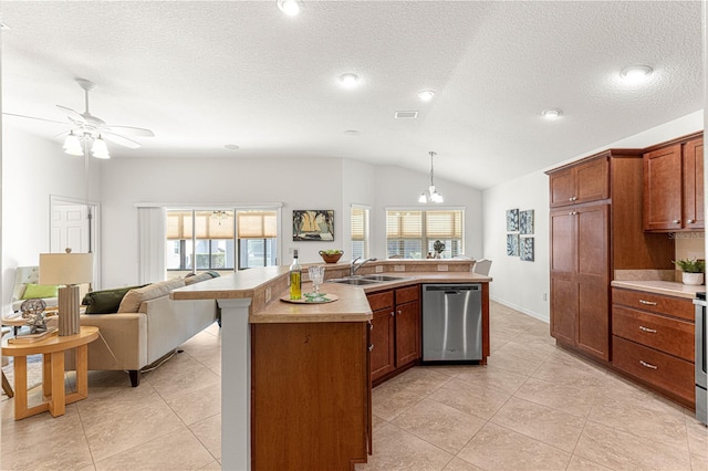 kitchen with sink, hanging light fixtures, stainless steel dishwasher, lofted ceiling, and a center island with sink