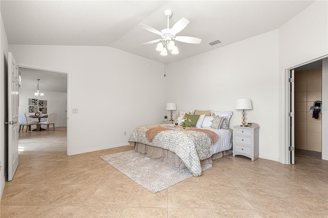 bedroom featuring ceiling fan with notable chandelier and lofted ceiling