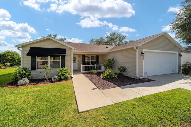 single story home with a front yard and a garage