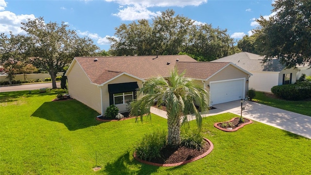 ranch-style home with a garage and a front yard