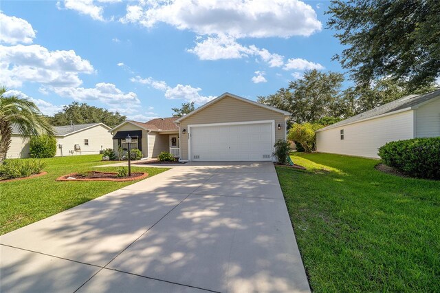 ranch-style home with a garage and a front yard