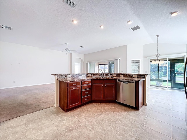 1338 Neuport Path, The Villages, FL 32163 - kitchen featuring dishwasher, light colored carpet, a ceiling fan, vaulted ceiling, and a textured ceiling