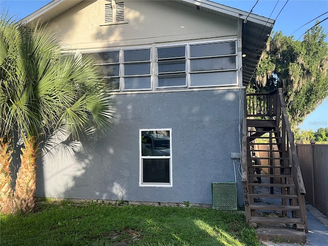 view of property exterior featuring a yard