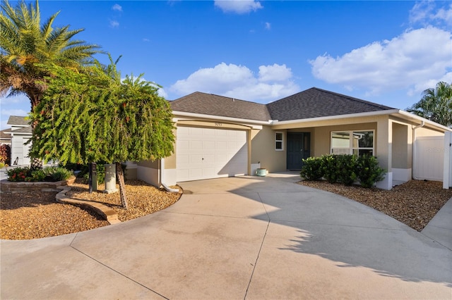 ranch-style home featuring a garage