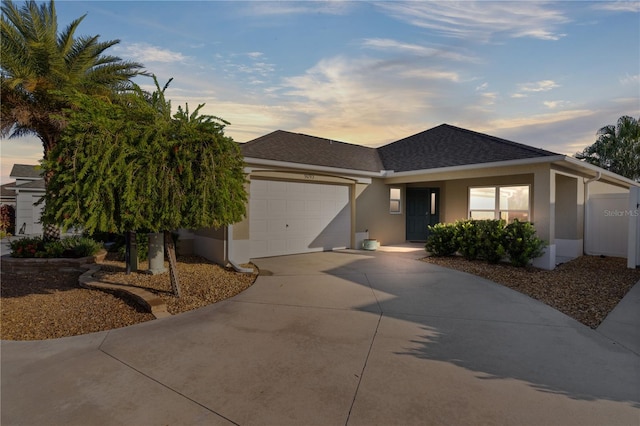 view of front of property featuring a garage