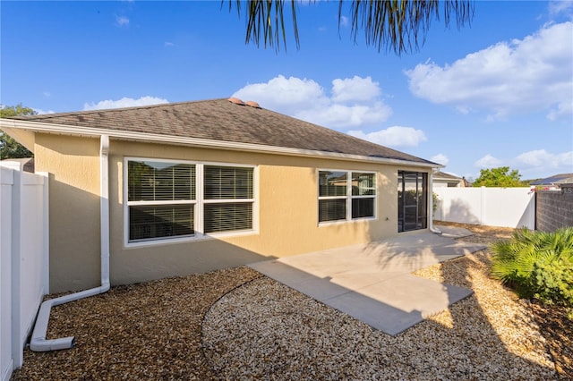 rear view of house with a patio area