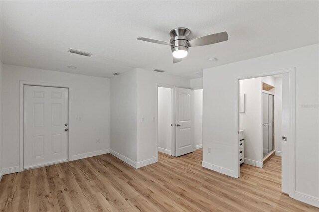 interior space featuring ceiling fan and light wood-type flooring