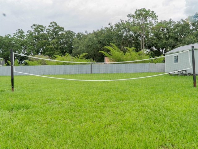 view of yard featuring volleyball court