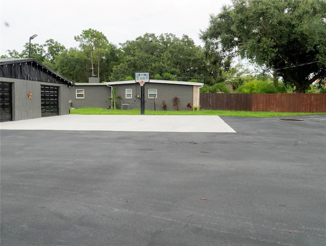 view of patio / terrace featuring a garage