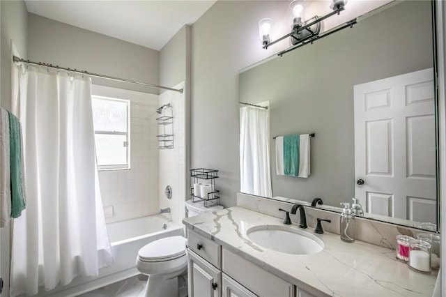 full bathroom featuring shower / bath combination with curtain, toilet, and vanity