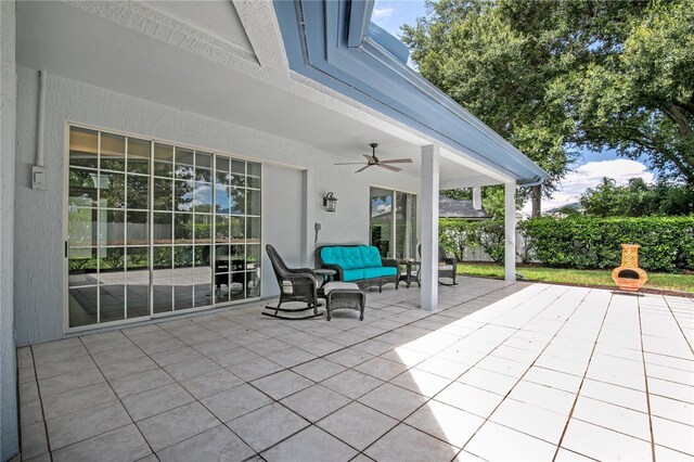 view of patio / terrace featuring ceiling fan