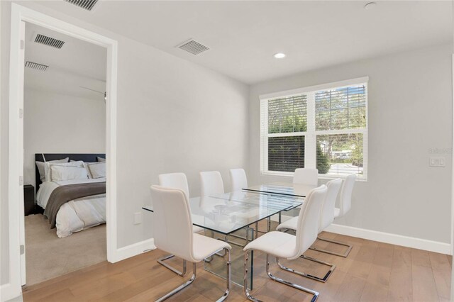 dining space featuring light wood-type flooring